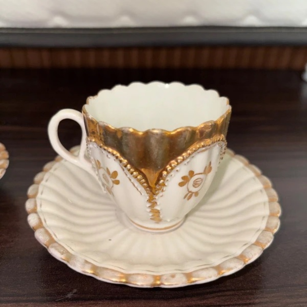 Gold and White Decorative Porcelain Teacup and Saucer - Picture 2 of 4